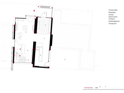 Black and white first floor architectural plan of a jewelry retail boutique showing entrance lobby, retail space, corridor, service counter, courtyard, jewelry display area, and storage room at 1:100 scale.