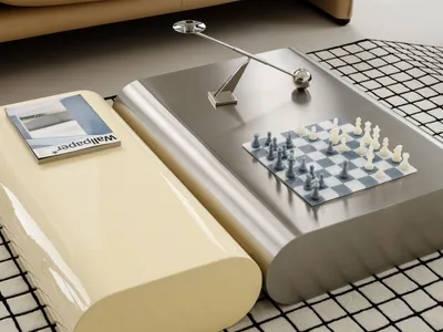 Modern living room scene featuring a tan leather sofa, a glossy cream curved coffee table, and a brushed stainless steel coffee table with a chessboard and a sculptural metal lamp on a black and white grid rug.