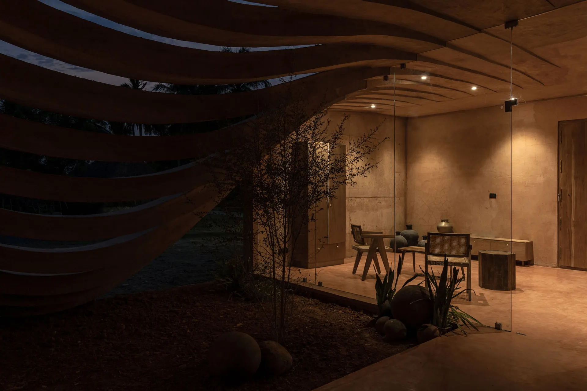 A modern living room with wooden furniture and materials, featuring a cozy ambiance and contemporary design.