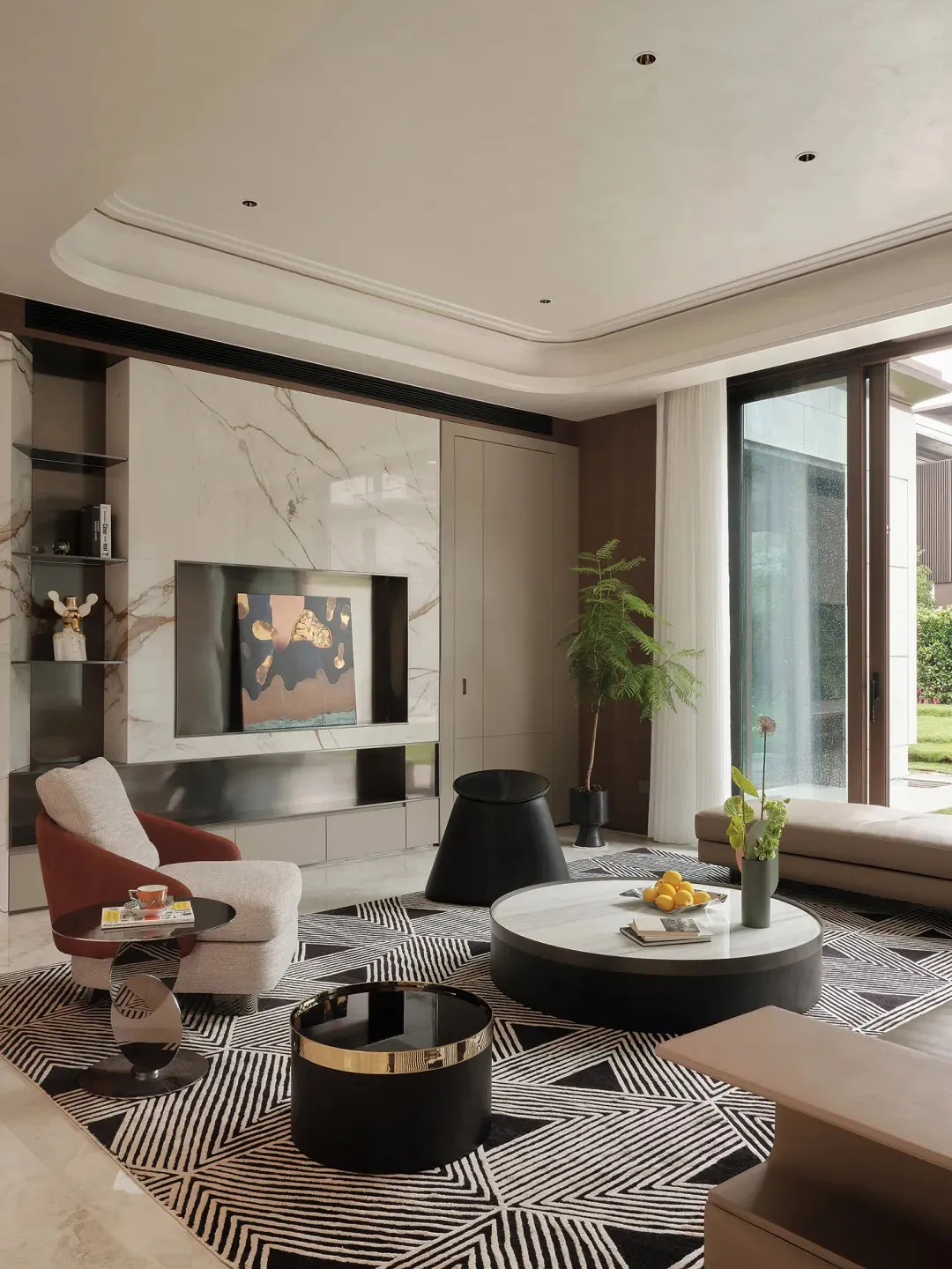 Modern living room featuring marble accents and contemporary furniture