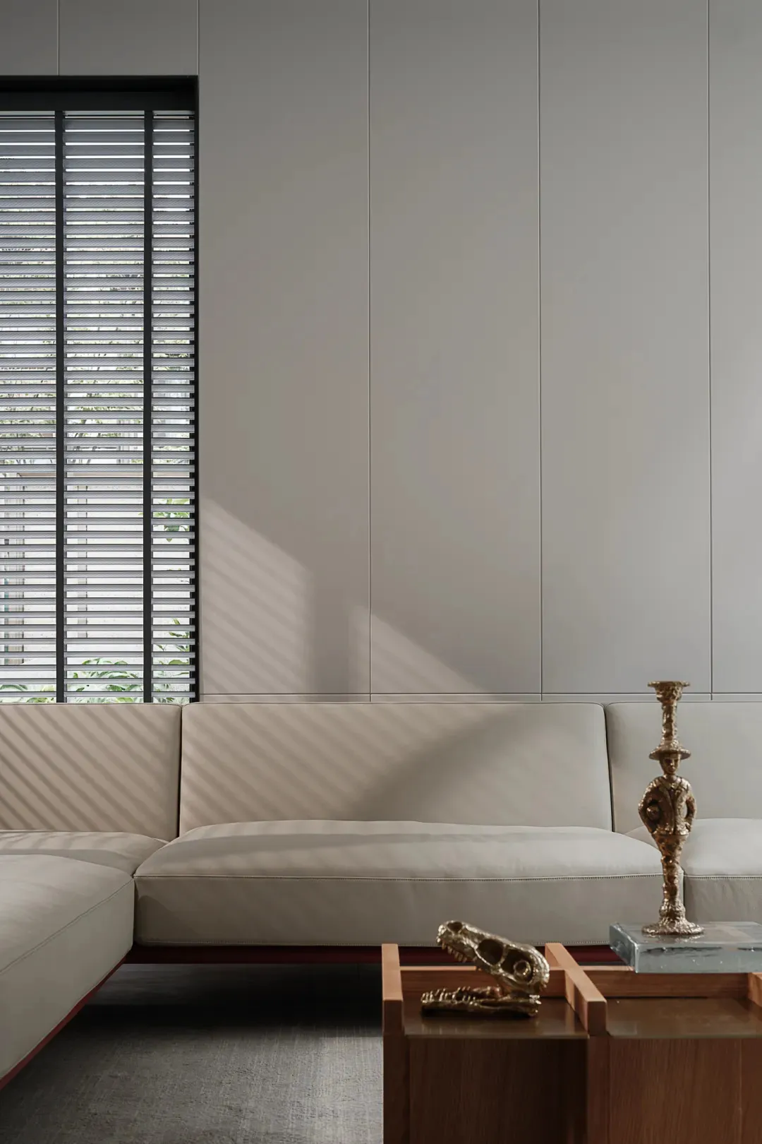 Modern minimalist living room with a white fabric couch.