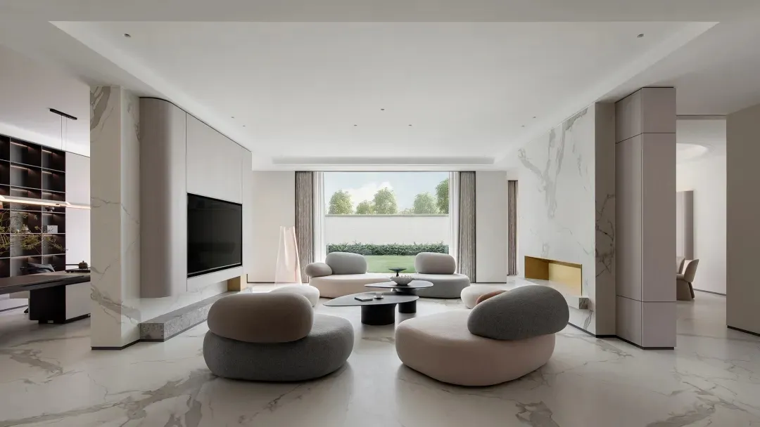 Modern style living room featuring elegant marble floors and furniture.