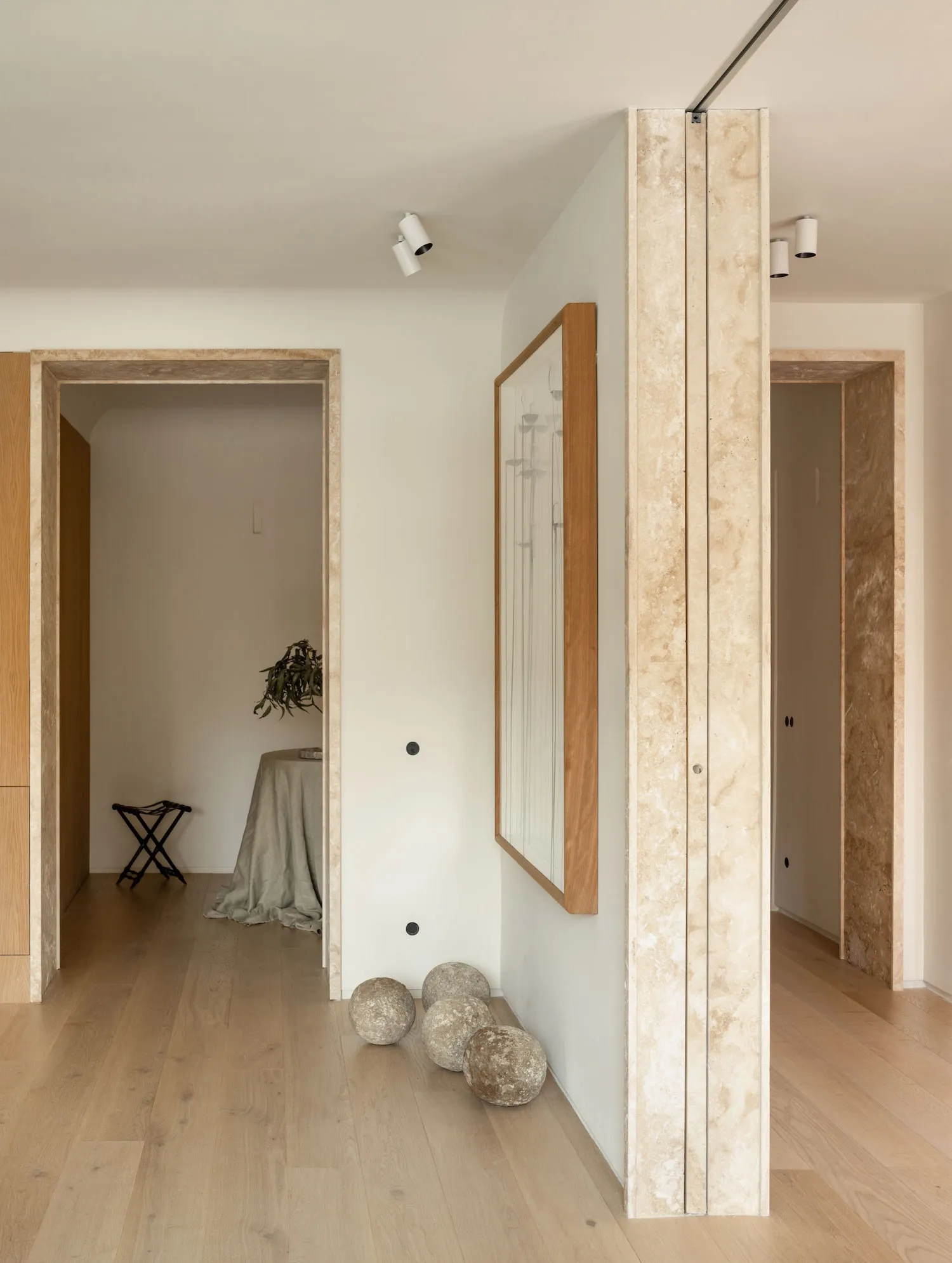 Modern living room with wooden floor and minimalist design.