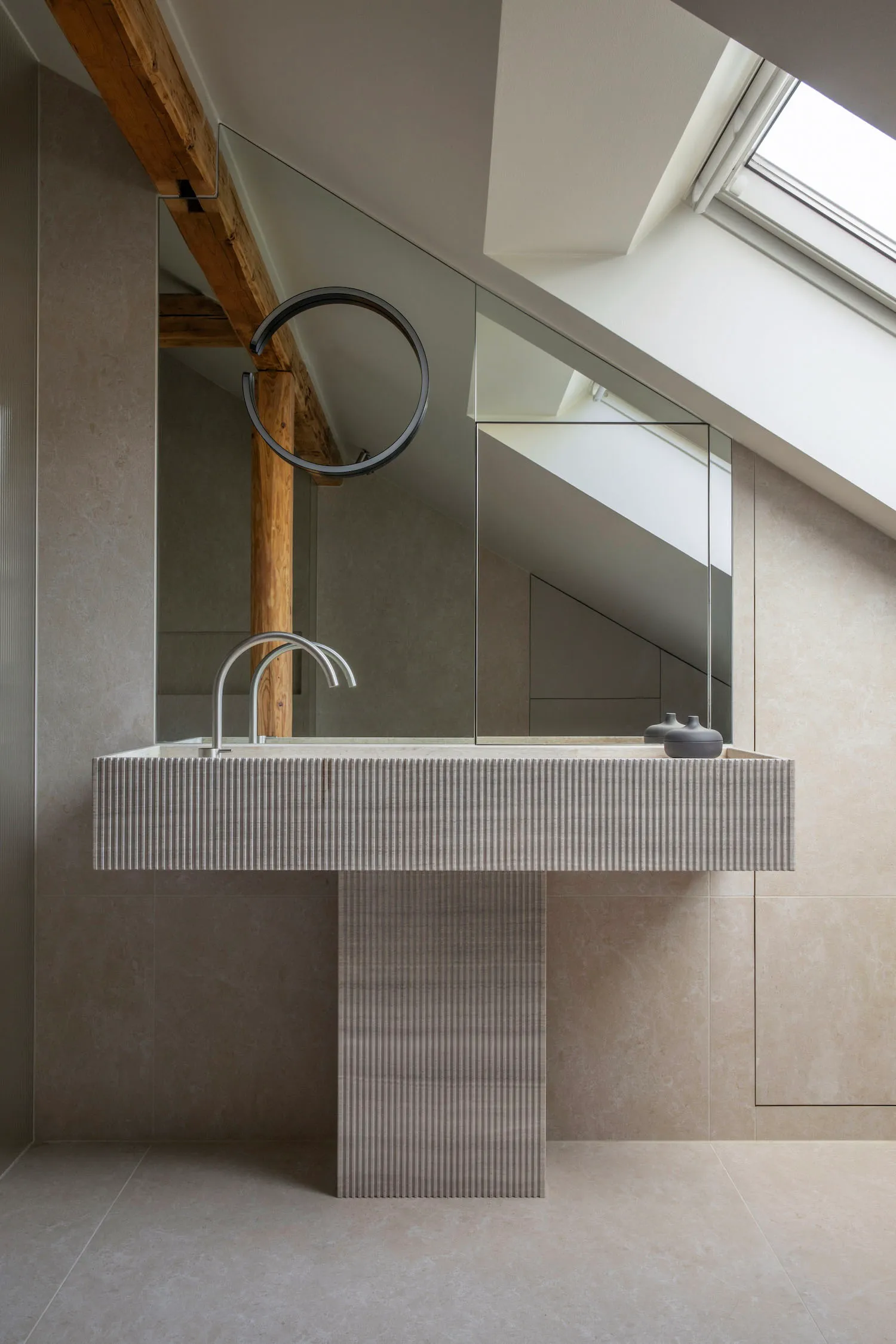 Modern bathroom designed with tile and concrete materials