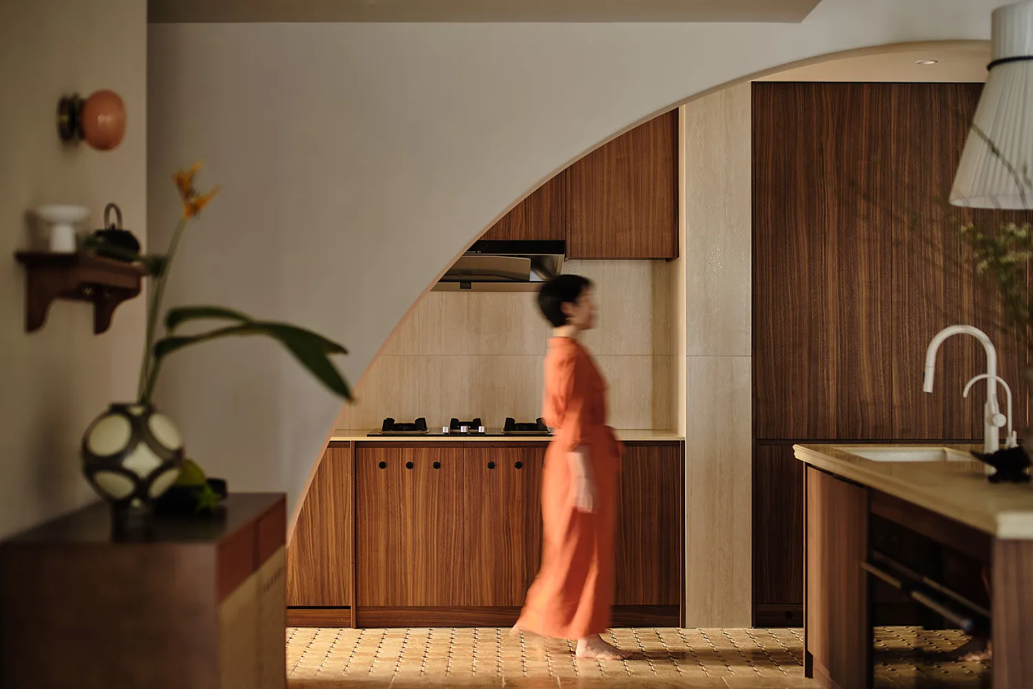 A modern residential interior with wood, stone, and glass features.