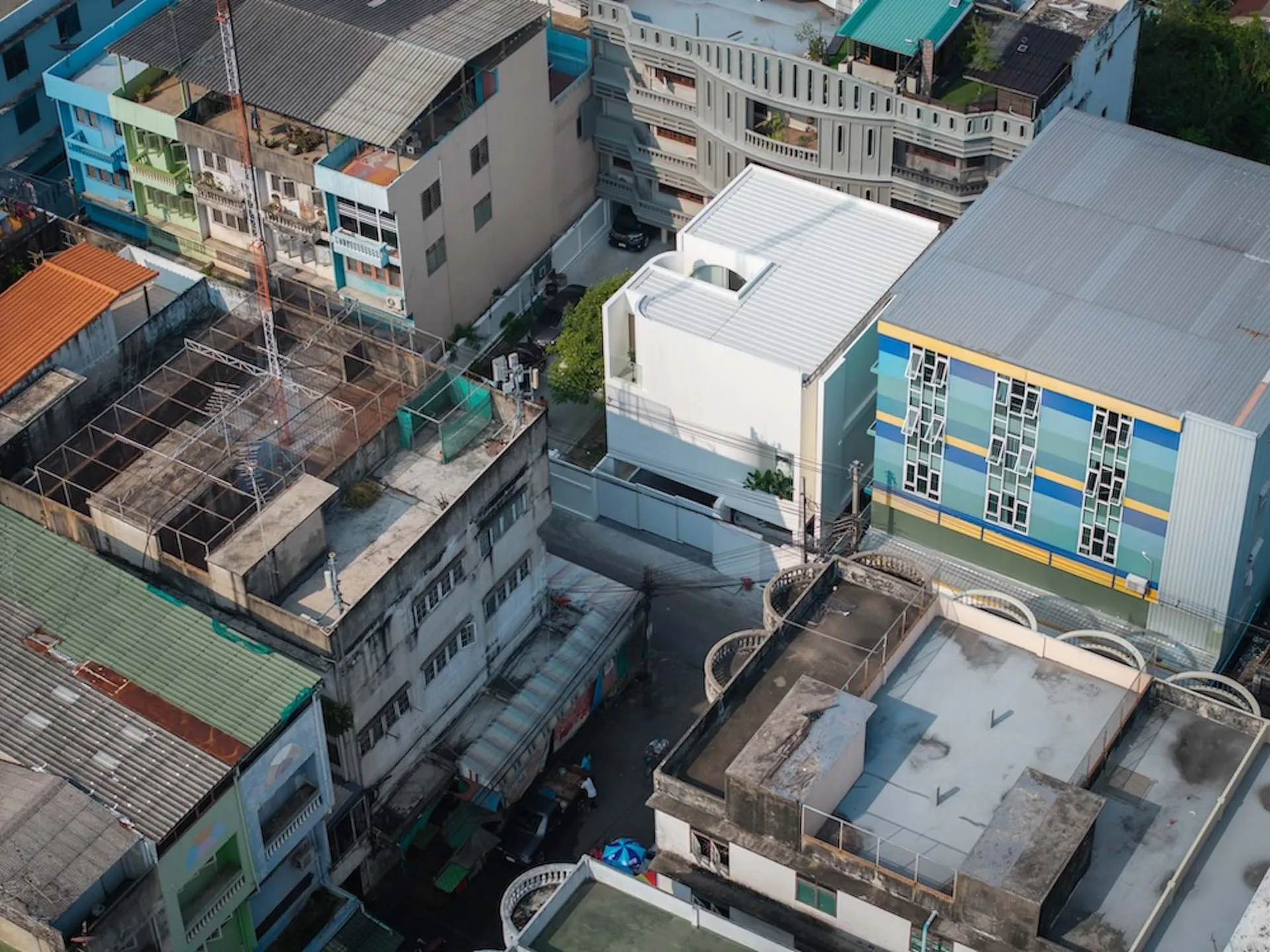 Residential buildings with concrete and metal roofing structures
