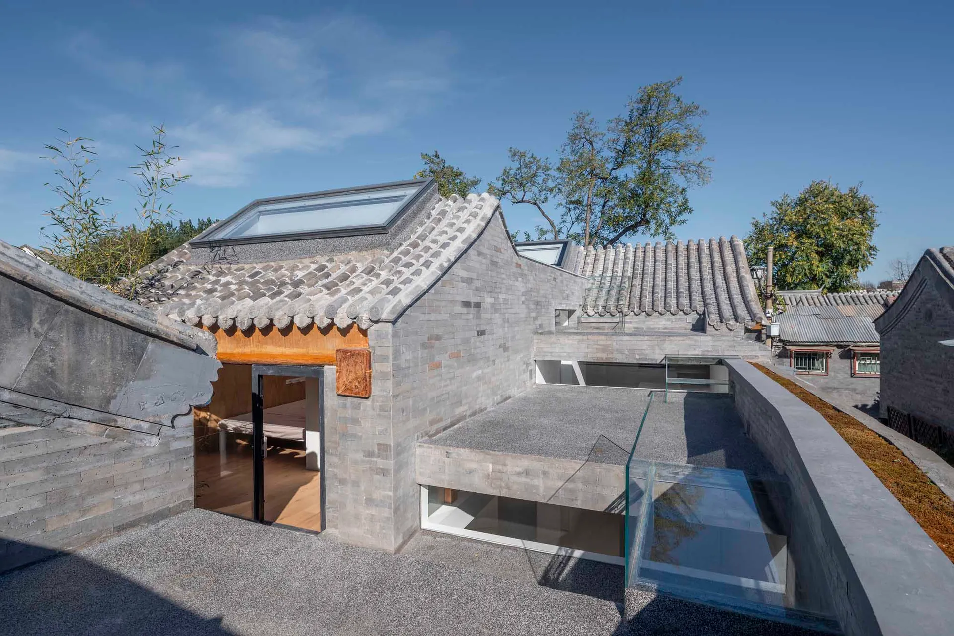 Modern residential outdoor area featuring concrete materials and a contemporary design.