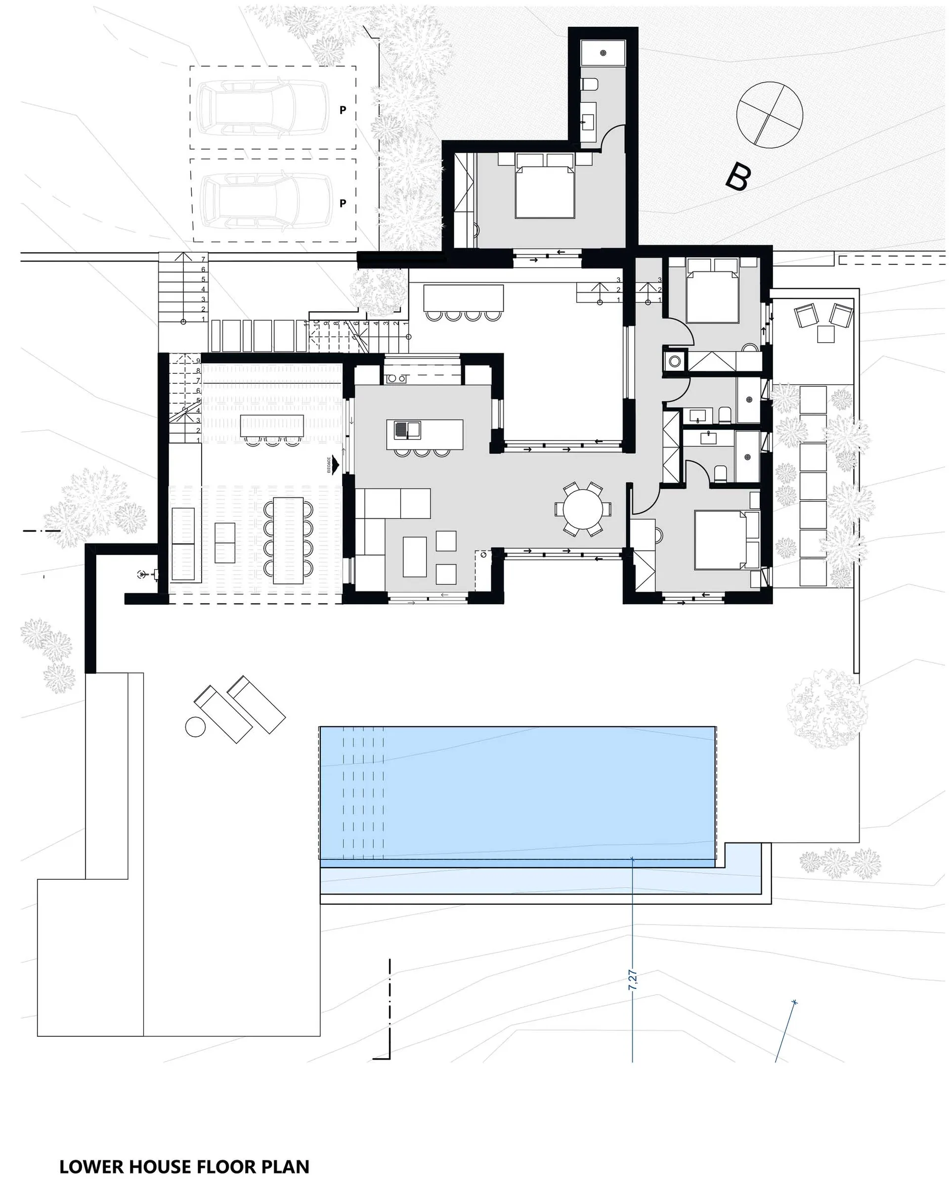 Floor plan of a modern residential house with glass, steel, and concrete materials.