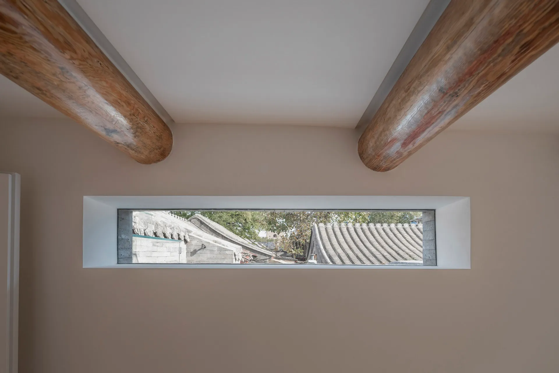 A modern interior featuring wooden beams