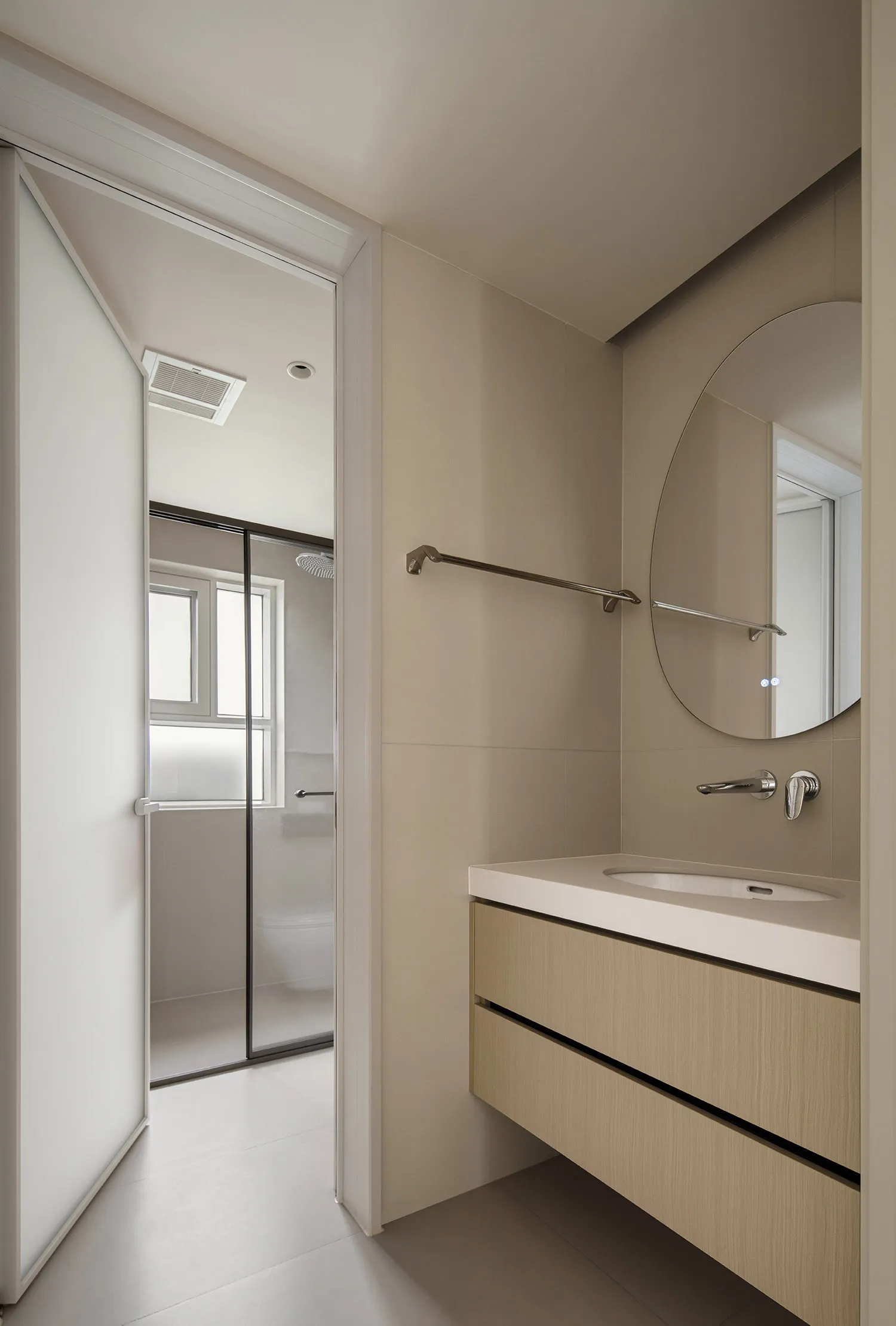 Modern bathroom with ceramic tiles and wooden vanity