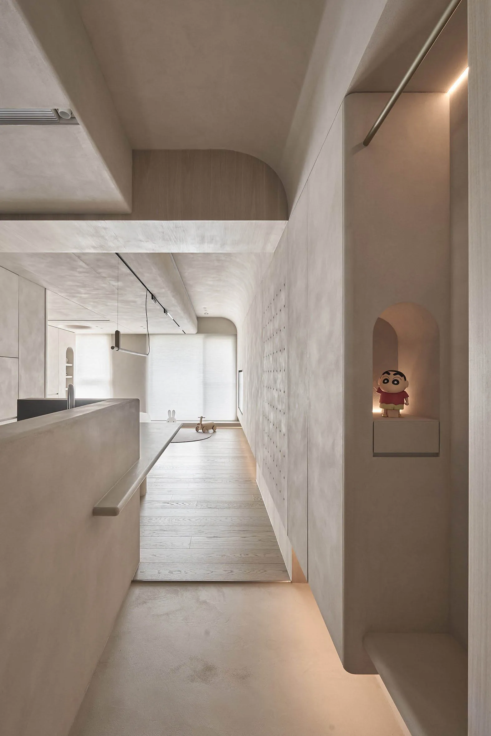 Modern minimalist interior designed with sleek concrete surfaces and minimal decor.