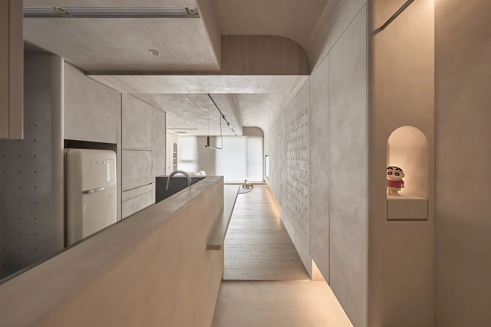 Modern residential interior with minimalist design and concrete walls.