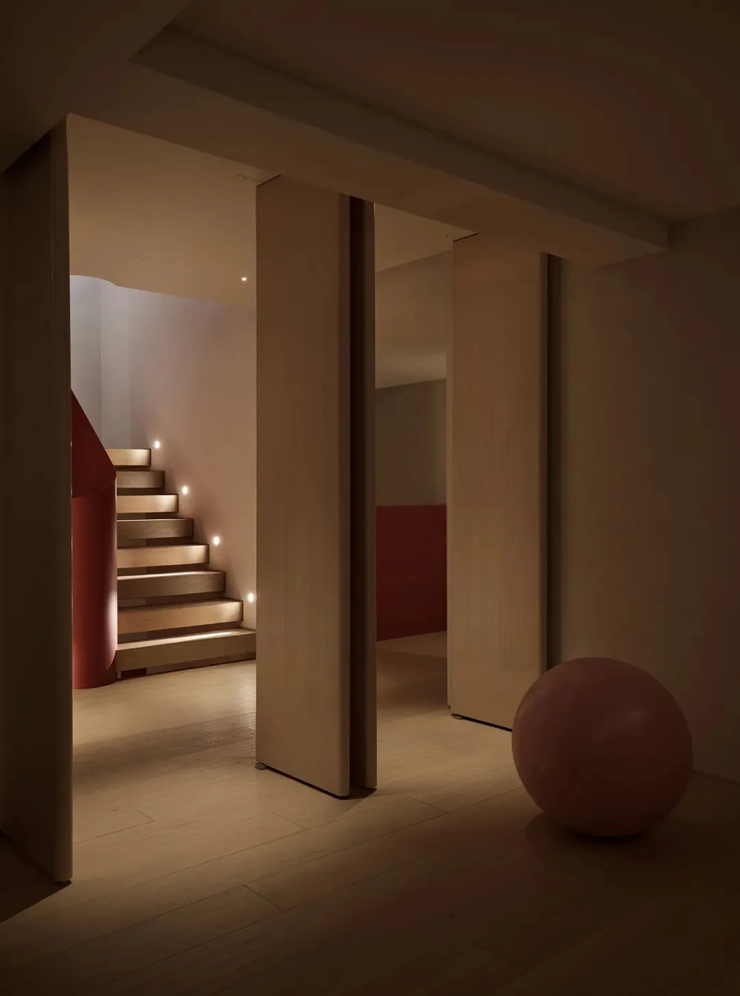 Modern minimalist living room with wooden paneling, extending the space of a home interior.