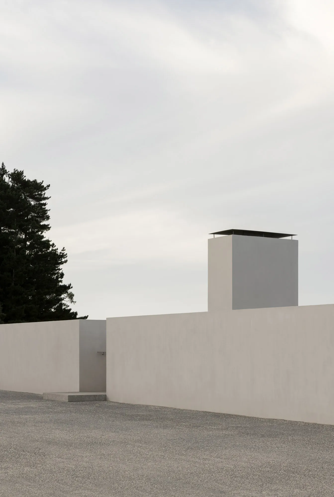 A minimalist concrete exterior featuring a simple, clean design.