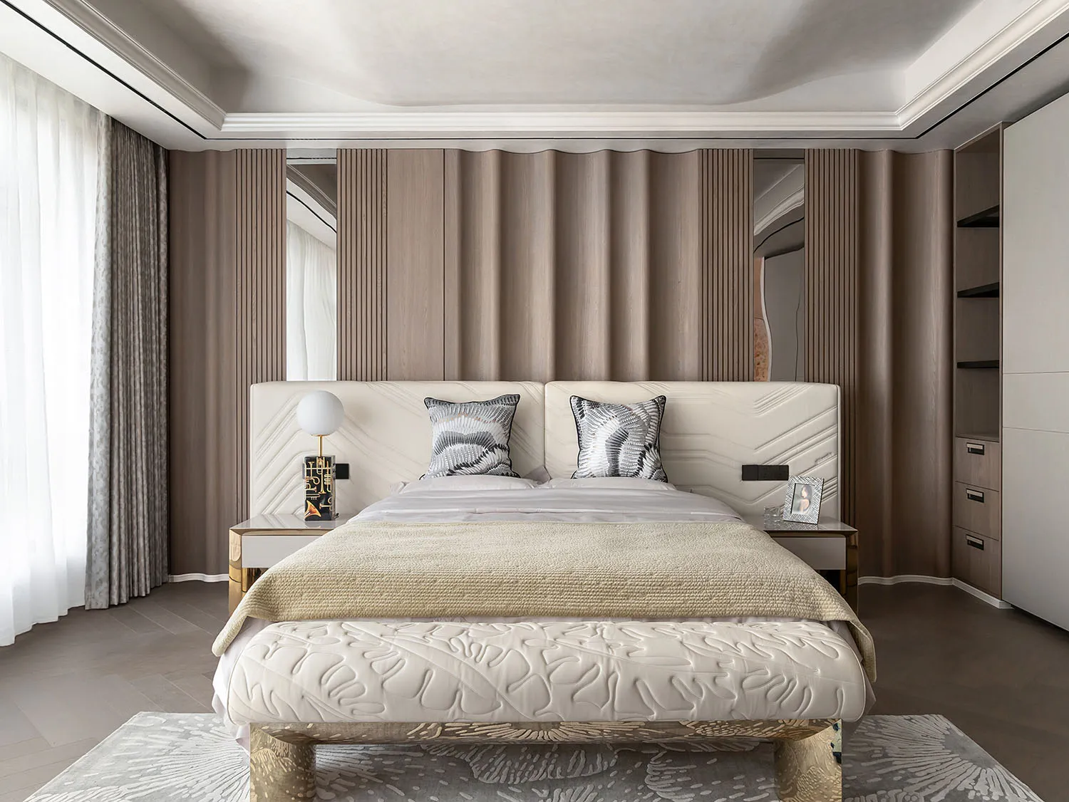 Modern bedroom featuring a wooden paneling accent wall with a contemporary bed and side tables.