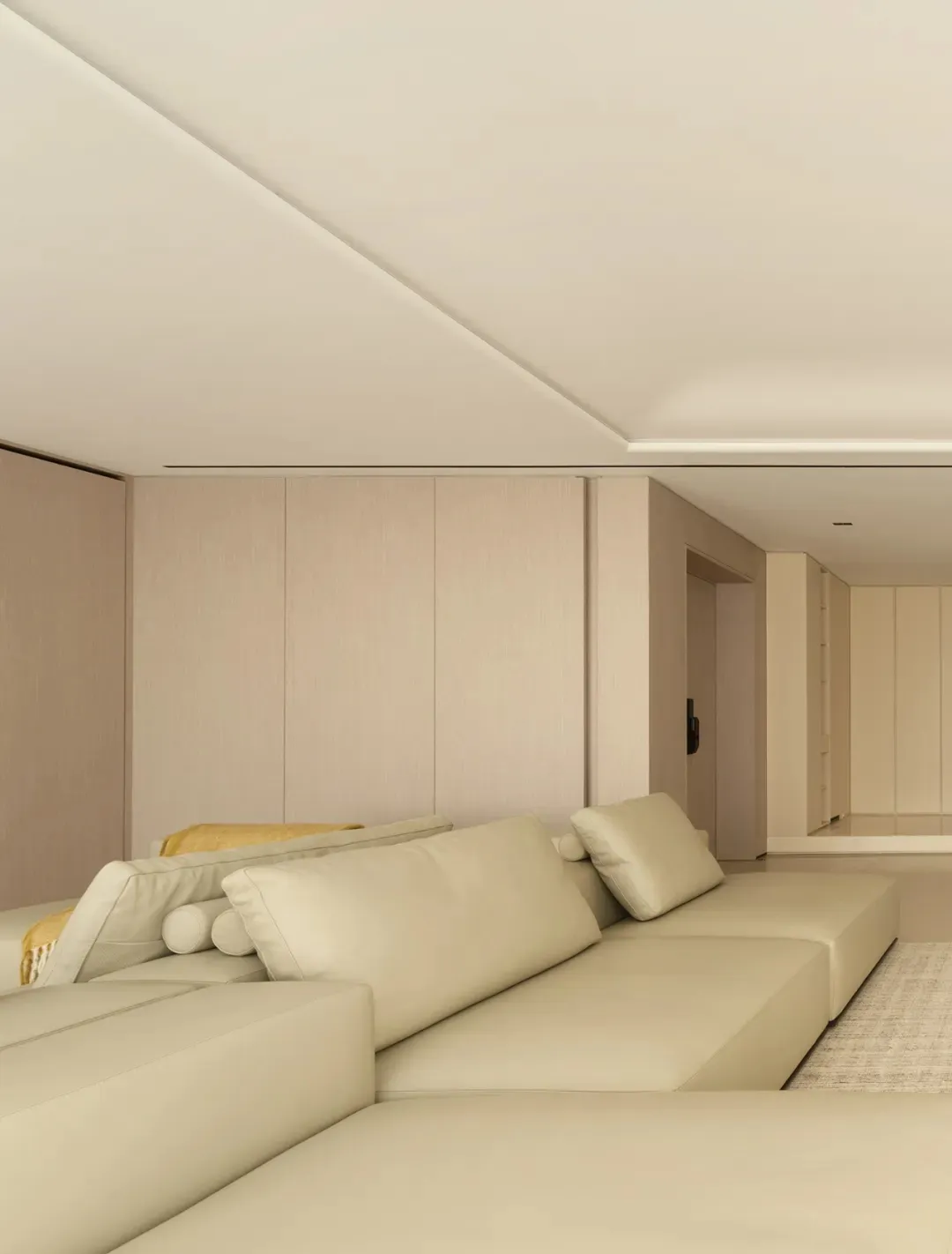Modern living room featuring a large leather sofa.