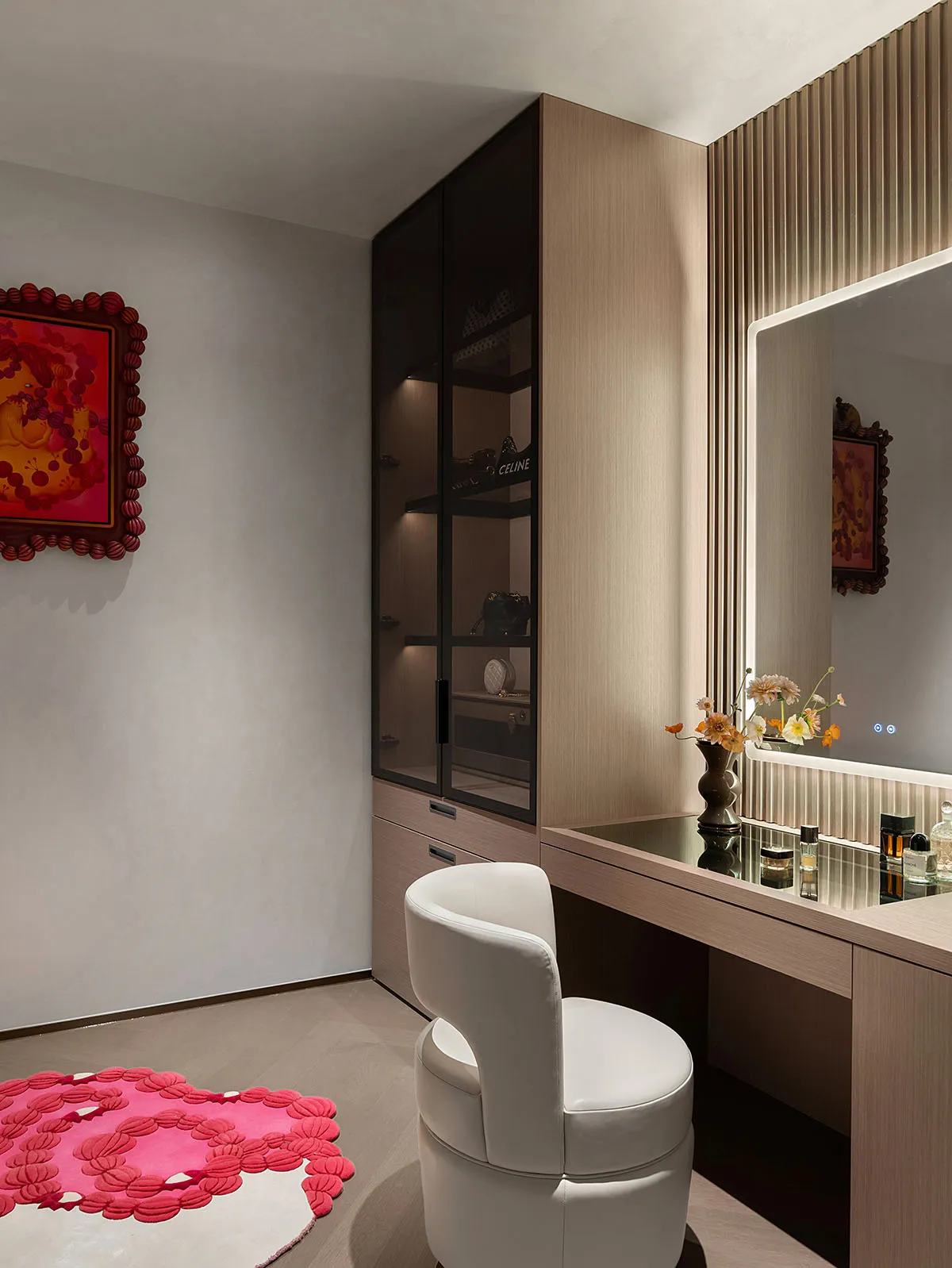 Modern interior design featuring a vanity area with wood and glass materials.
