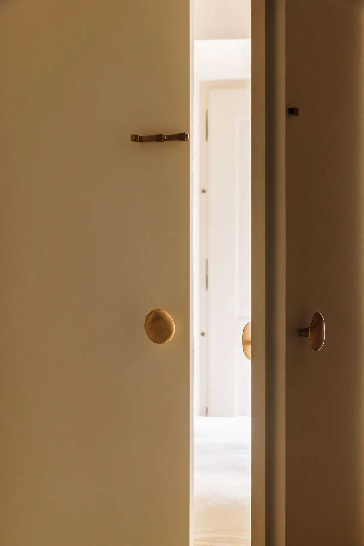 Modern minimalist interior with brass door handles