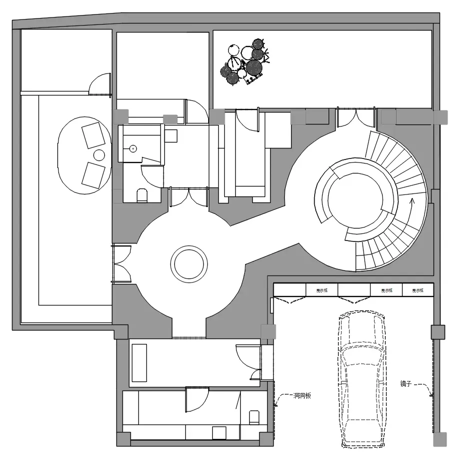 現代建築平面圖，強調開放式生活空間與中央圓形樓梯。