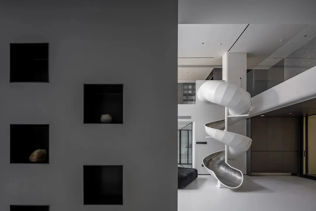 Modern interior design featuring sleek concrete elements and minimalist aesthetics.
