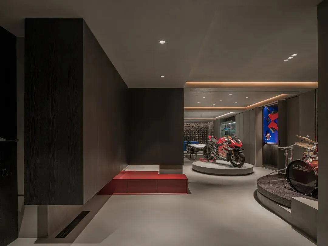 Indoor living area featuring modern industrial design with concrete and wood accents