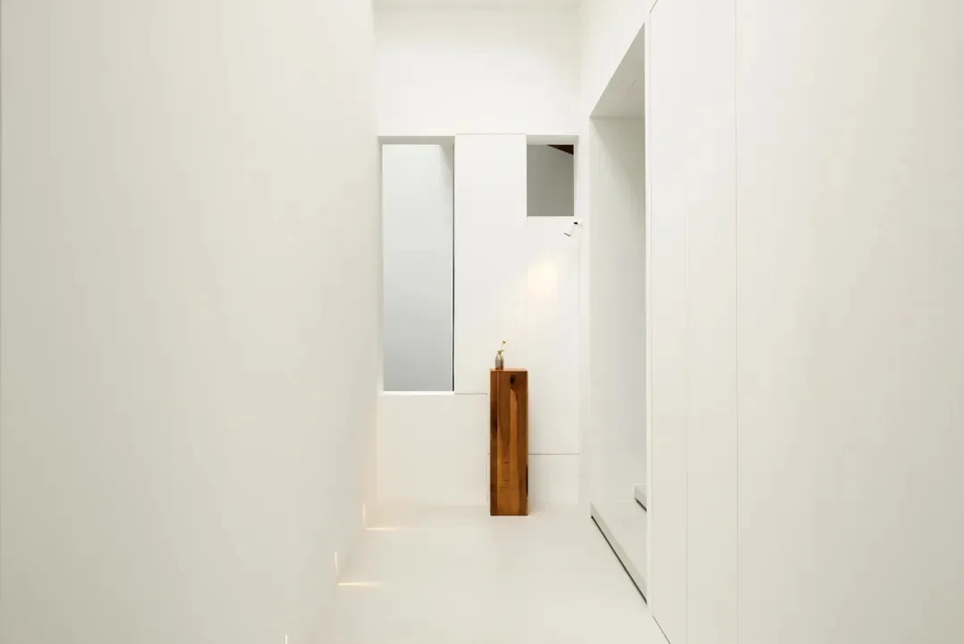 Modern interior with granite flooring, minimalist design elements.