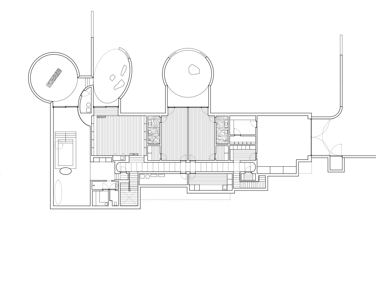 Floor plan of a modern residential building with wooden flooring.