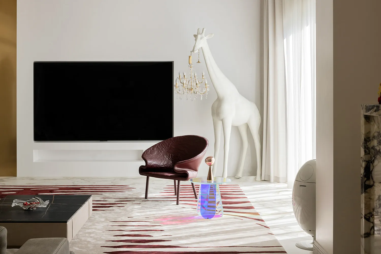 Modern minimalist living room with white metal furniture and a white giraffe statue