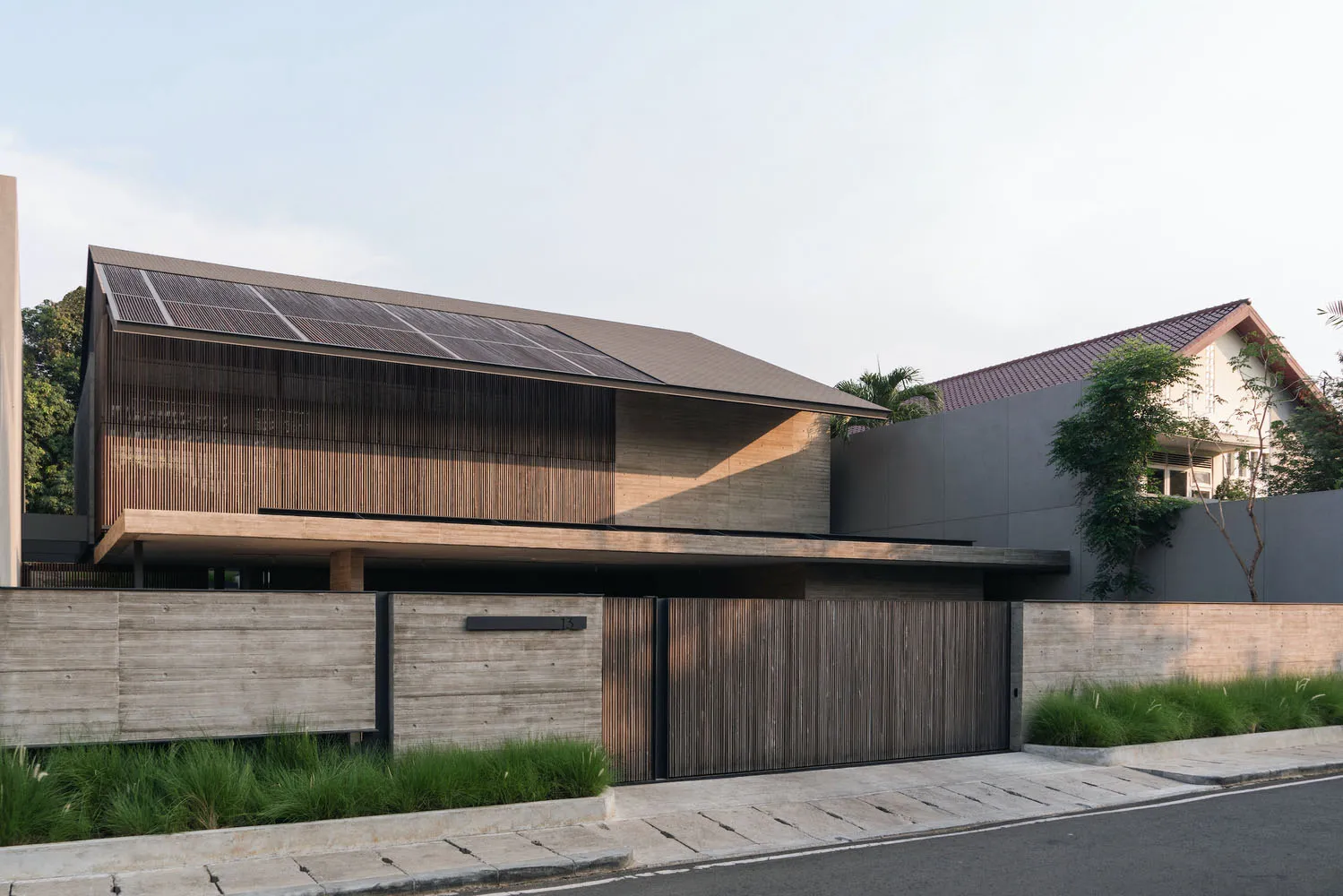 Modern residential house with concrete and wood exterior materials
