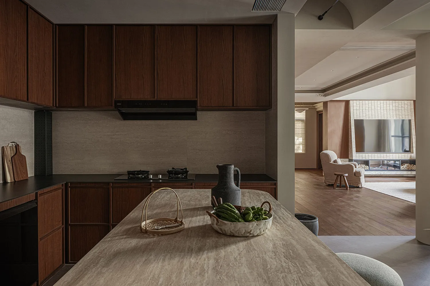 Modern residential kitchen featuring wooden cabinets and a stone countertop.
