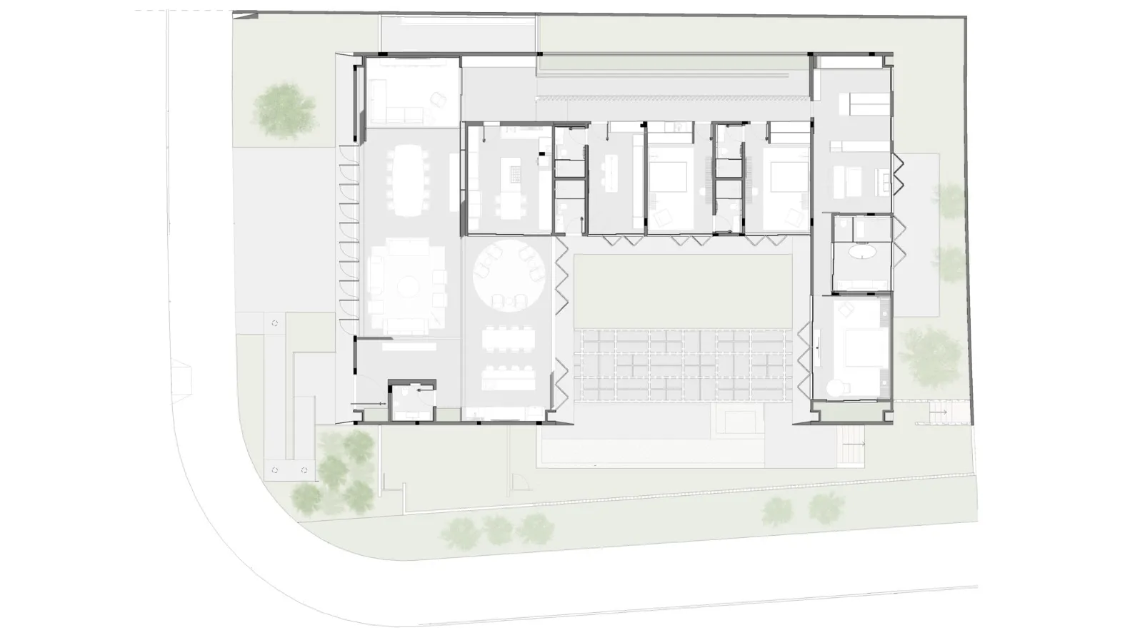 A floor plan of a modern office space with white flooring and minimalist design