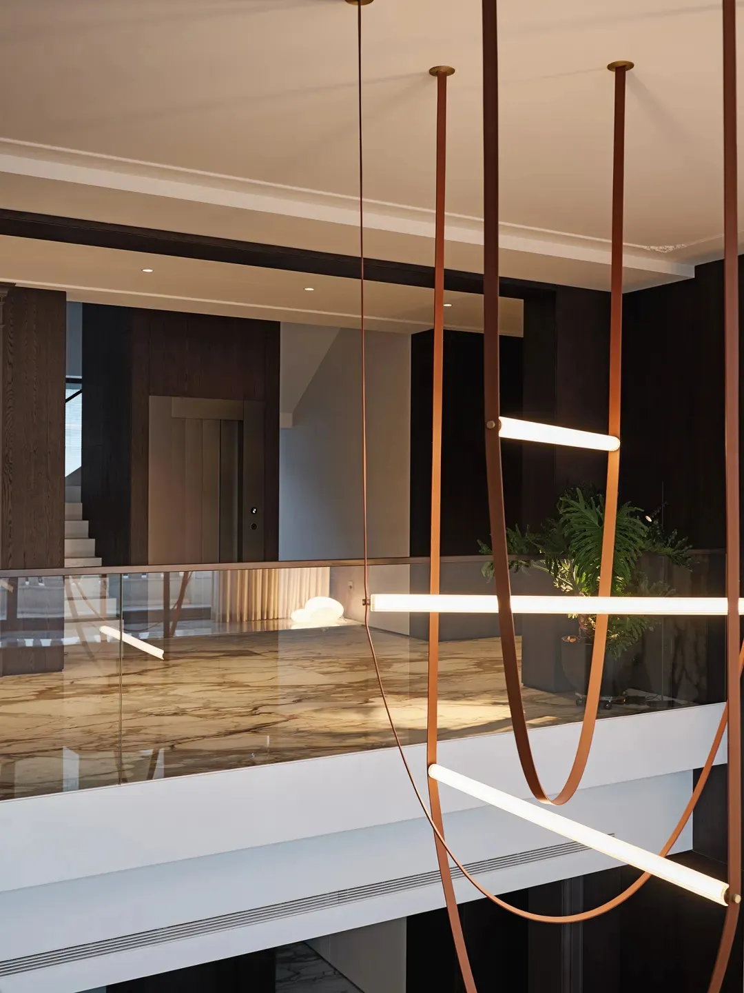 A modern residential interior featuring contemporary design elements and materials.