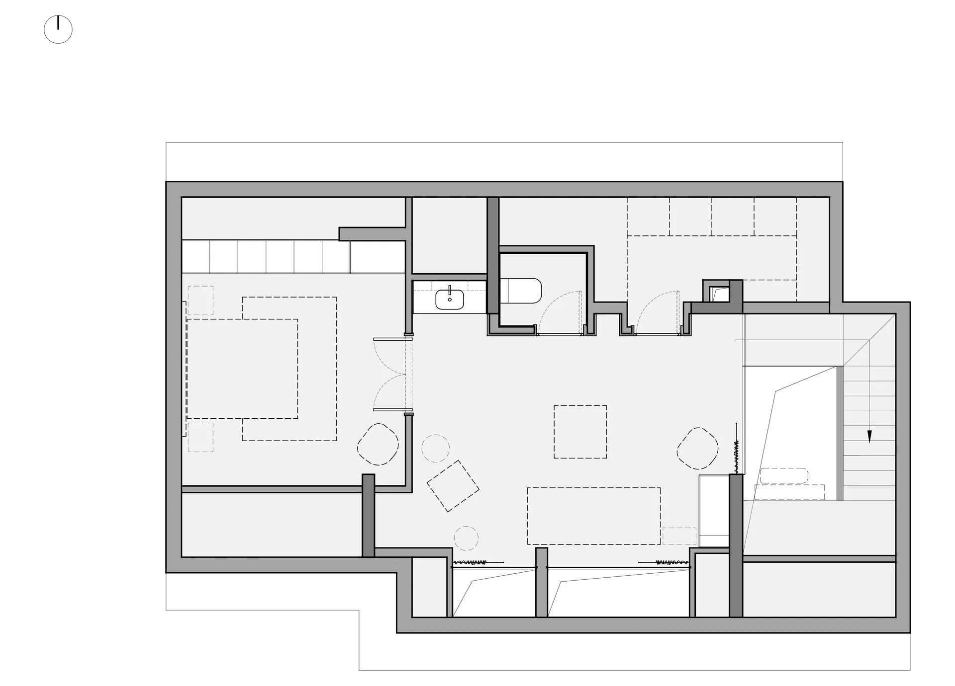Floor plan of a modern residential interior with open spaces and minimalist design elements.