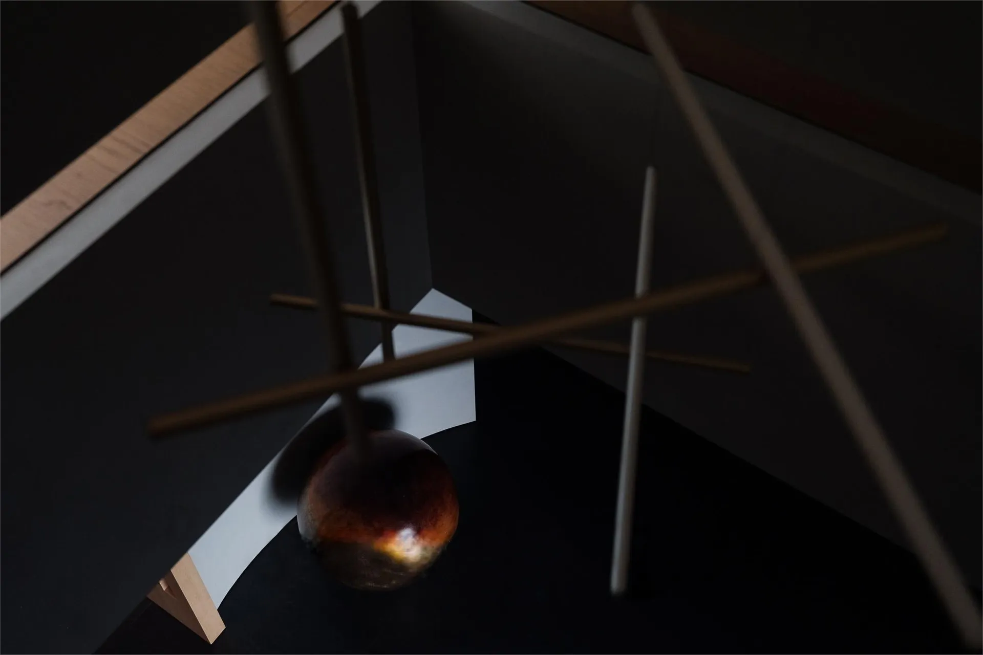 A minimalist interior design featuring a wooden element.