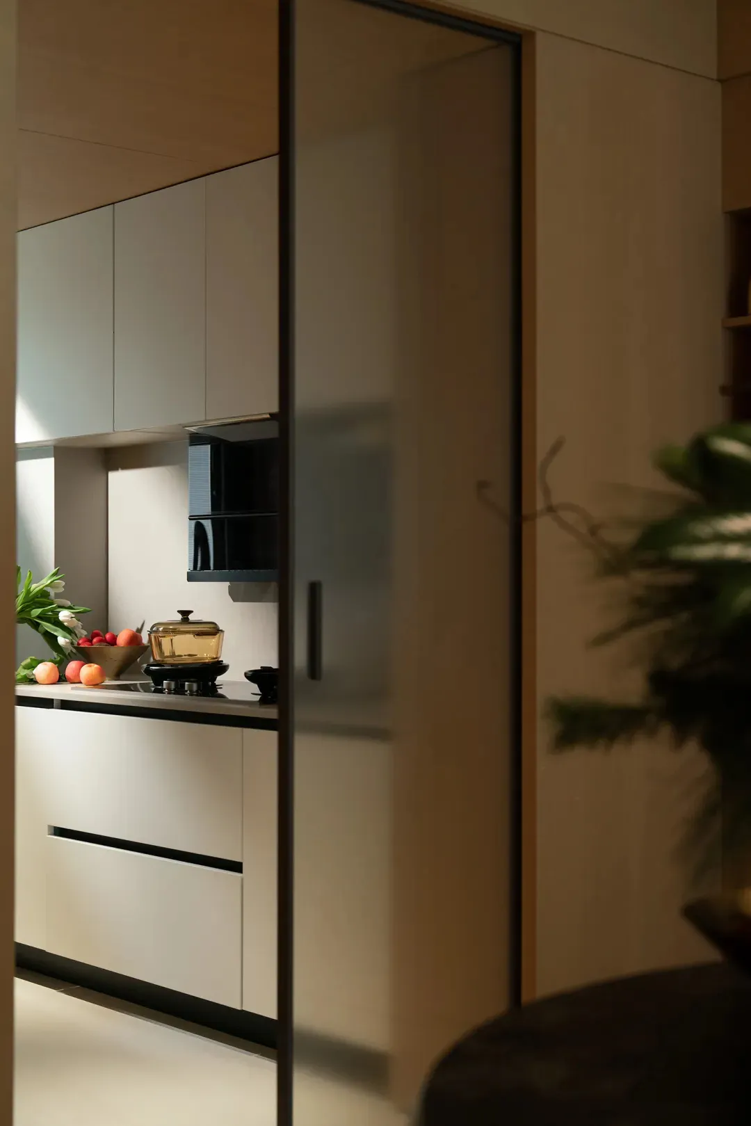 Modern kitchen with sleek, minimalist design featuring contemporary laminate materials and clean lines.