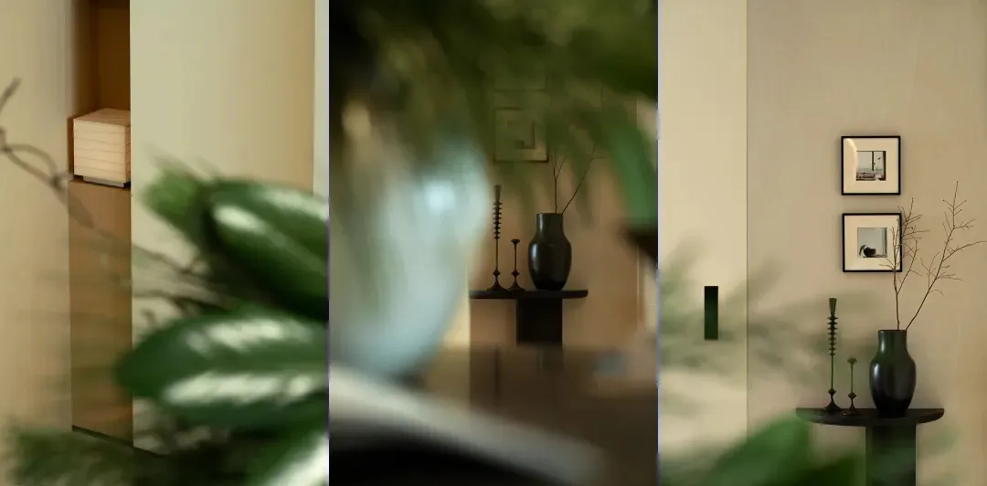 現代客廳擁有俐落木質地板、玻璃牆面與茂盛室內植物。