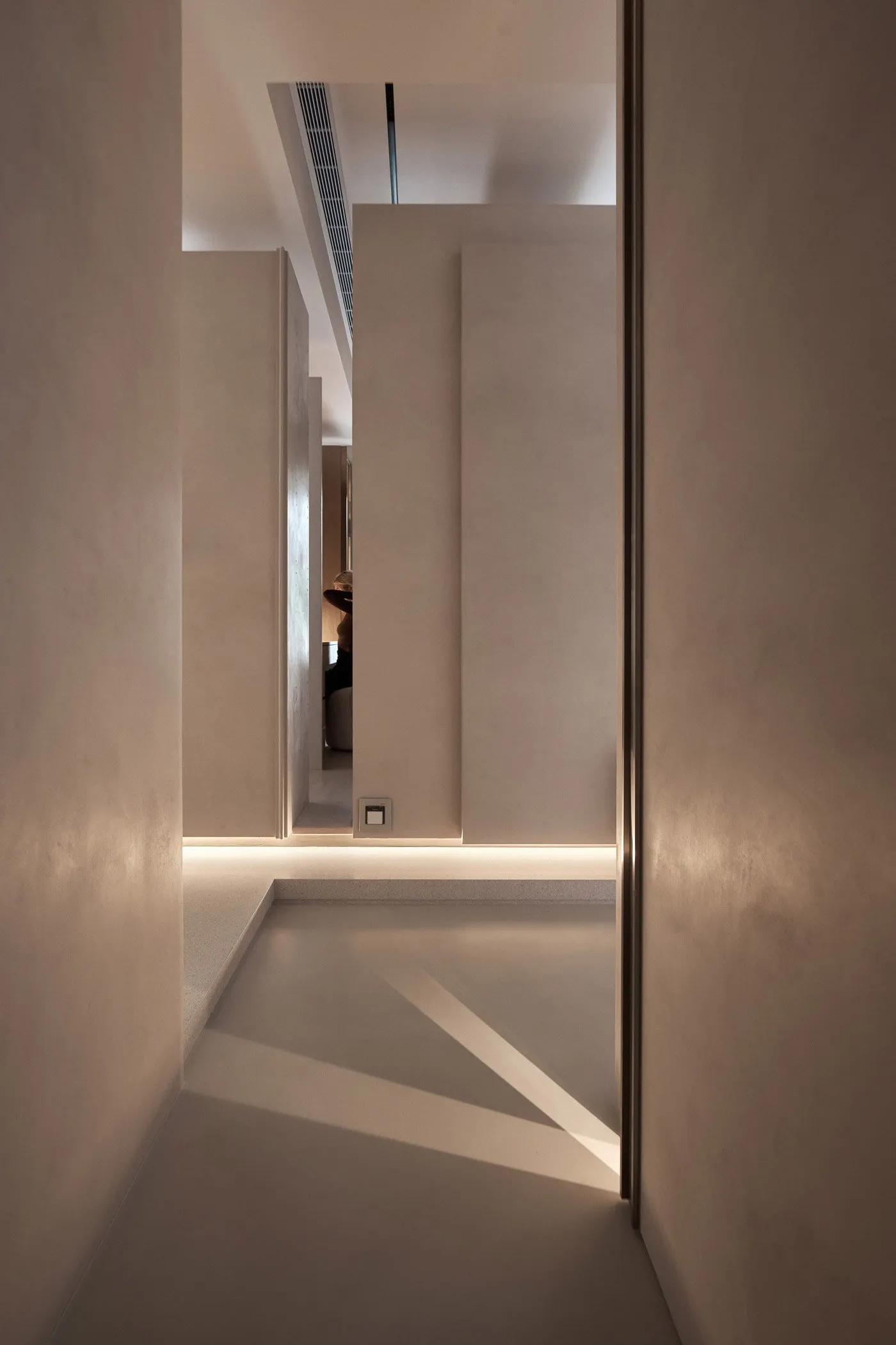 Modern minimalist interior space with walls in white plaster.
