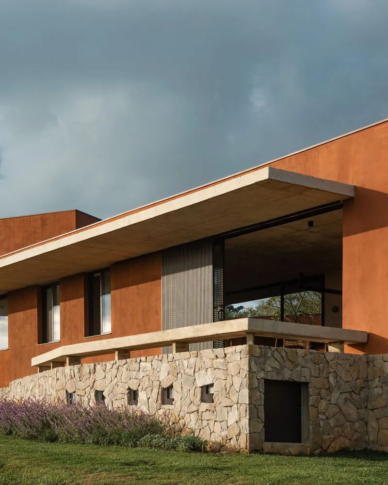 A modern building with concrete and stone exterior.