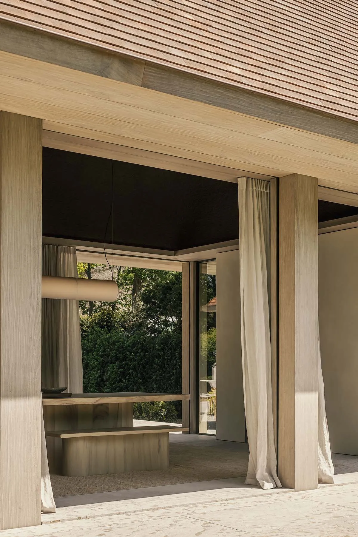 Modern interior space featuring wooden architecture and clean lines.