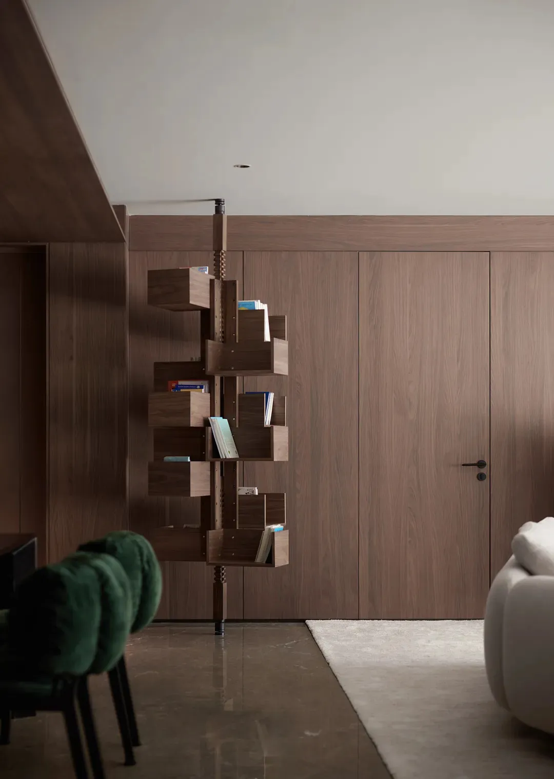 A modern interior design featuring a free-standing wooden shelving unit.