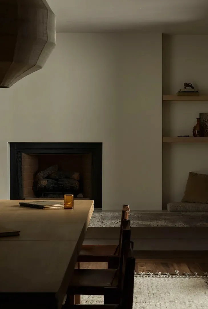 A minimalist residential space with wooden interior details.