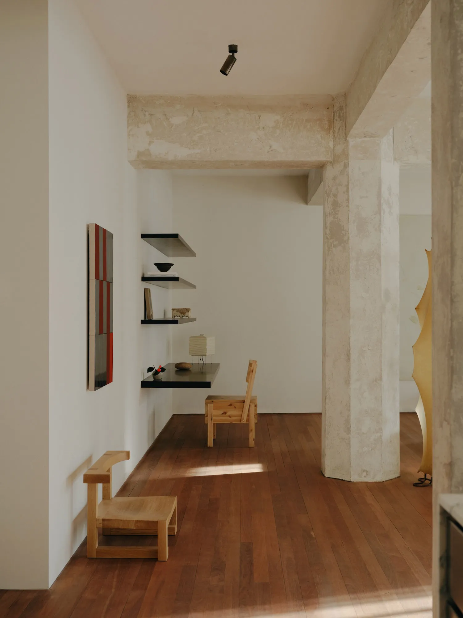 Minimalist office interior with wooden furniture and concrete wall