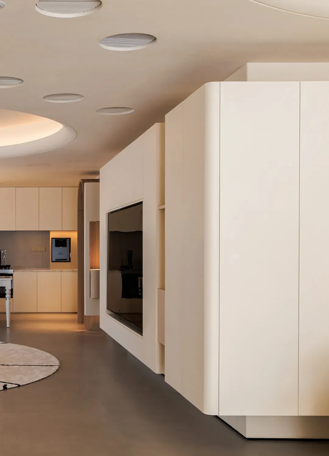 Contemporary white kitchen with sleek cabinets and clean lines.