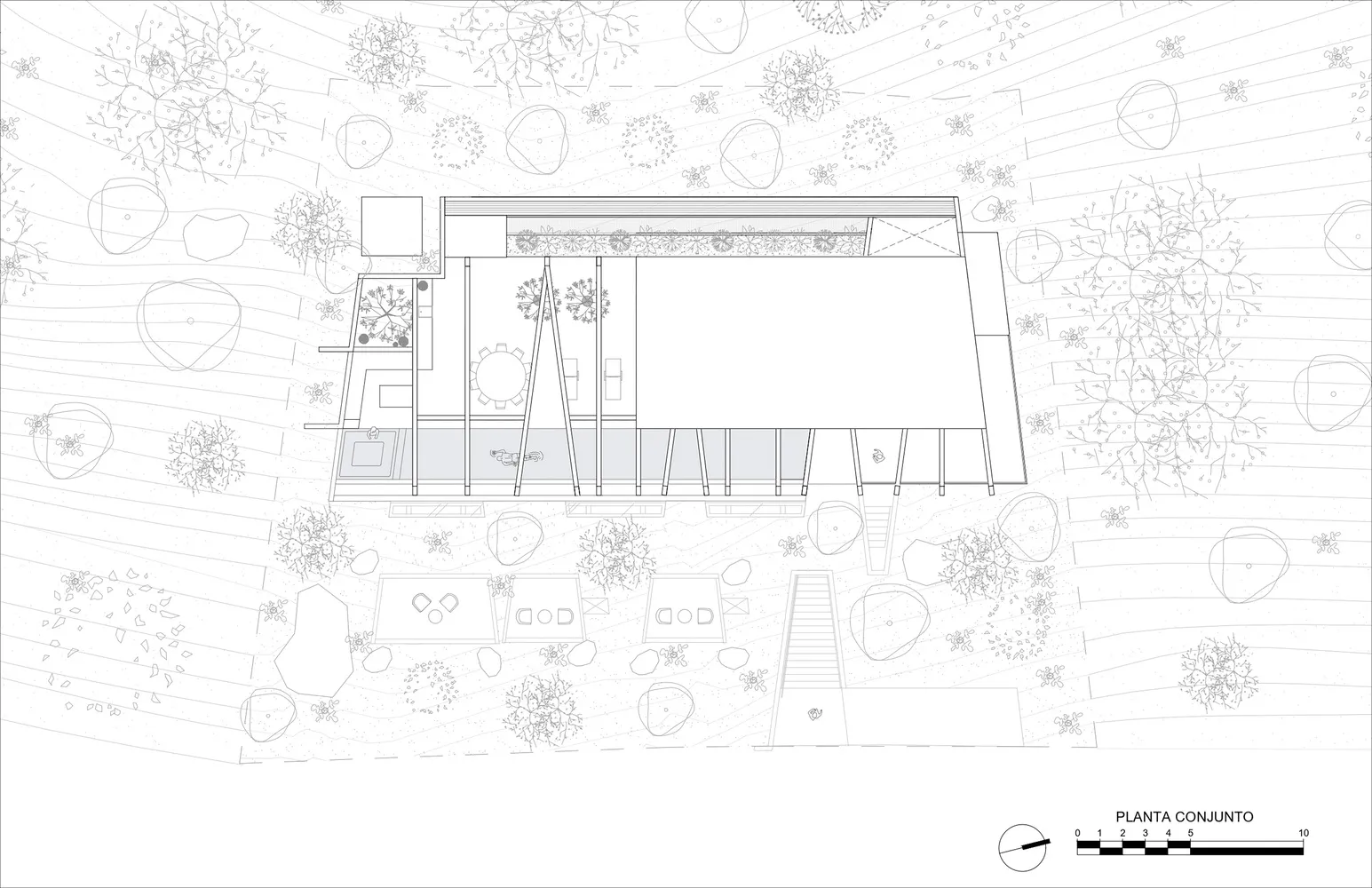 A detailed architectural plan depicting a modern residential structure with indoor and outdoor spaces.