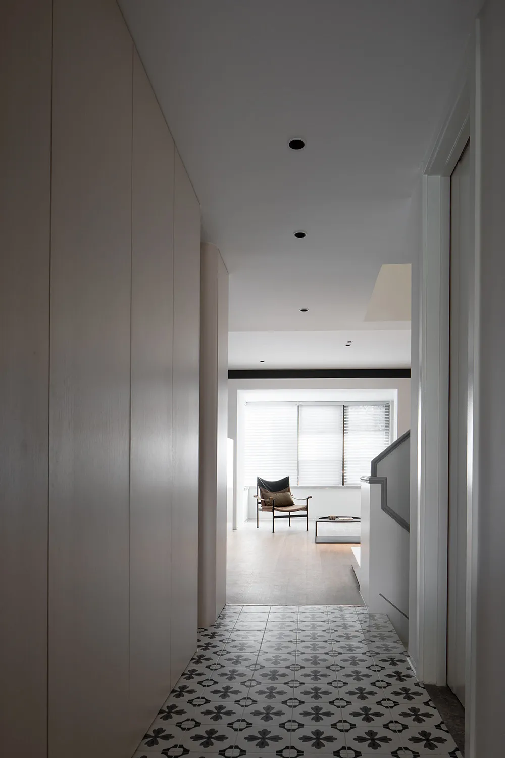 A modern interior space with a tiled floor.