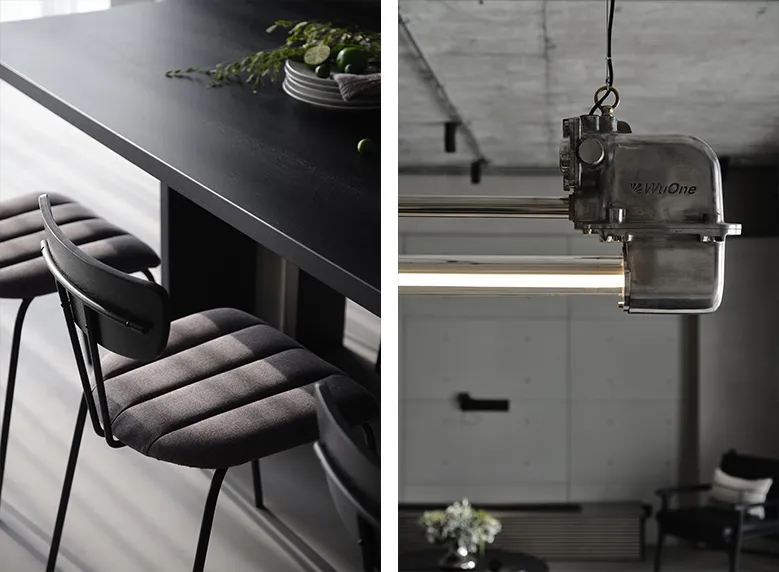 Modern office space featuring metal and concrete materials.