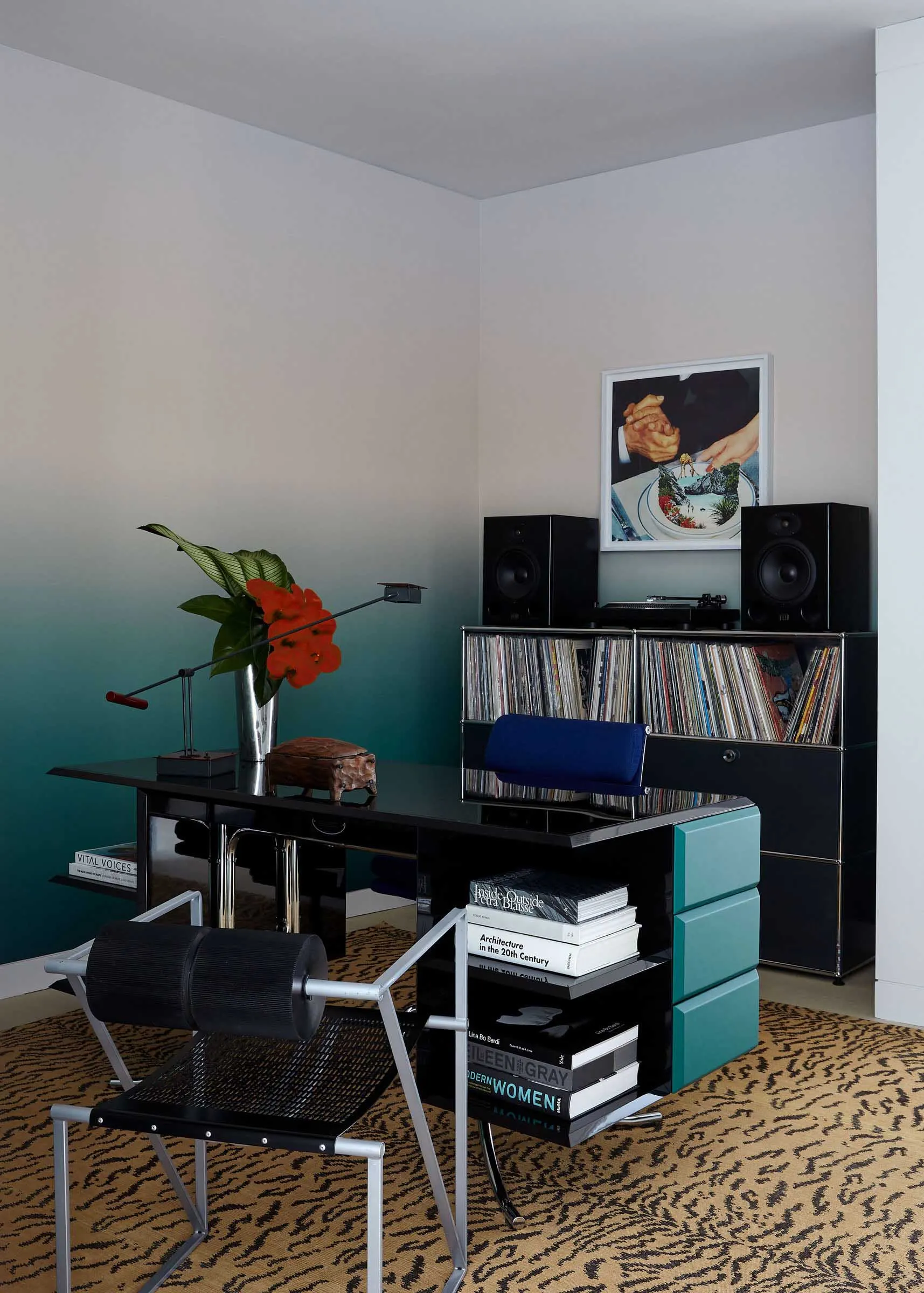 A modern home office featuring mixed materials and a sleek, functional design.