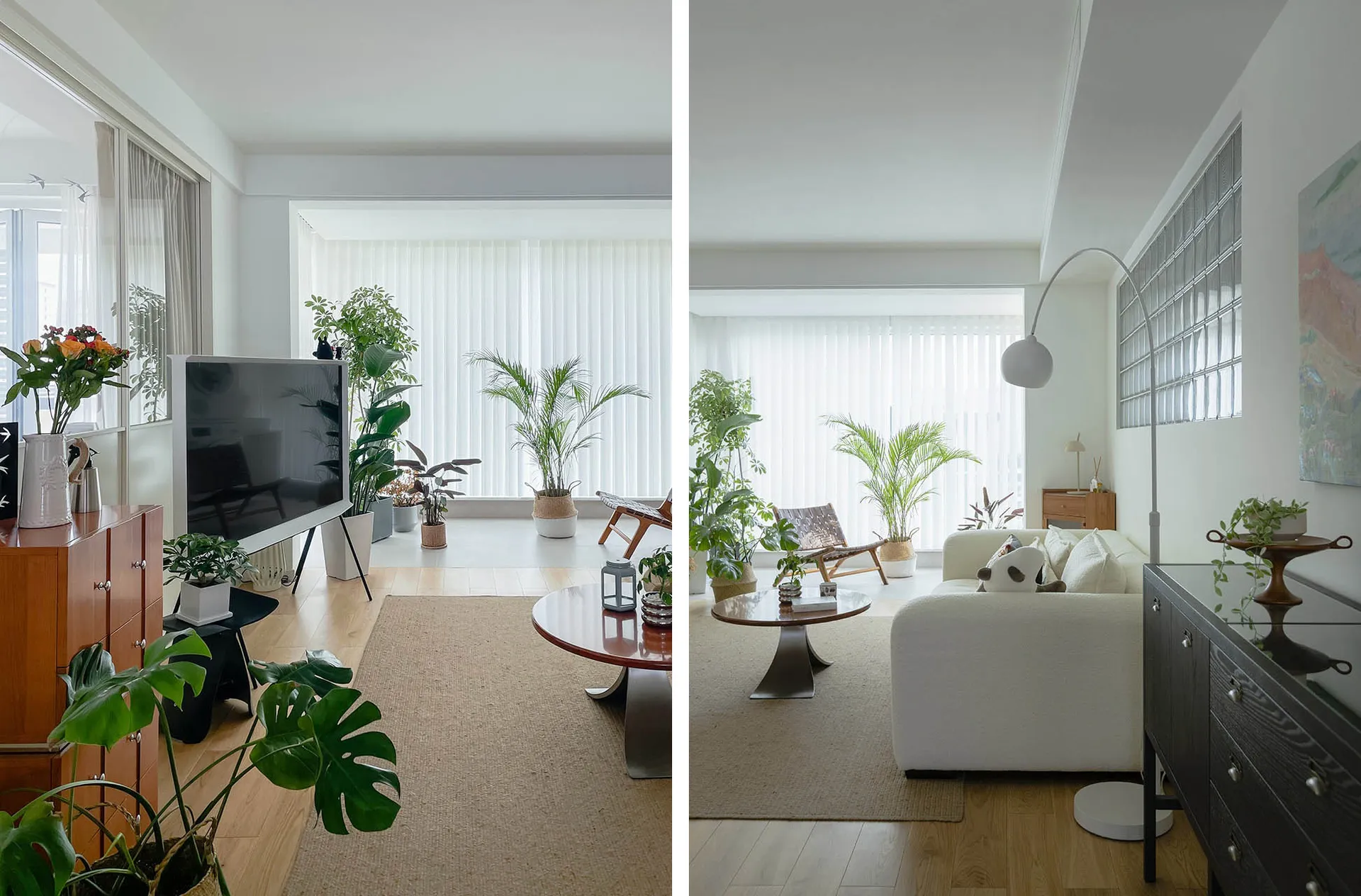 A modern minimalist living room with wooden flooring, glass windows, comfortable seating, and a variety of indoor plants.