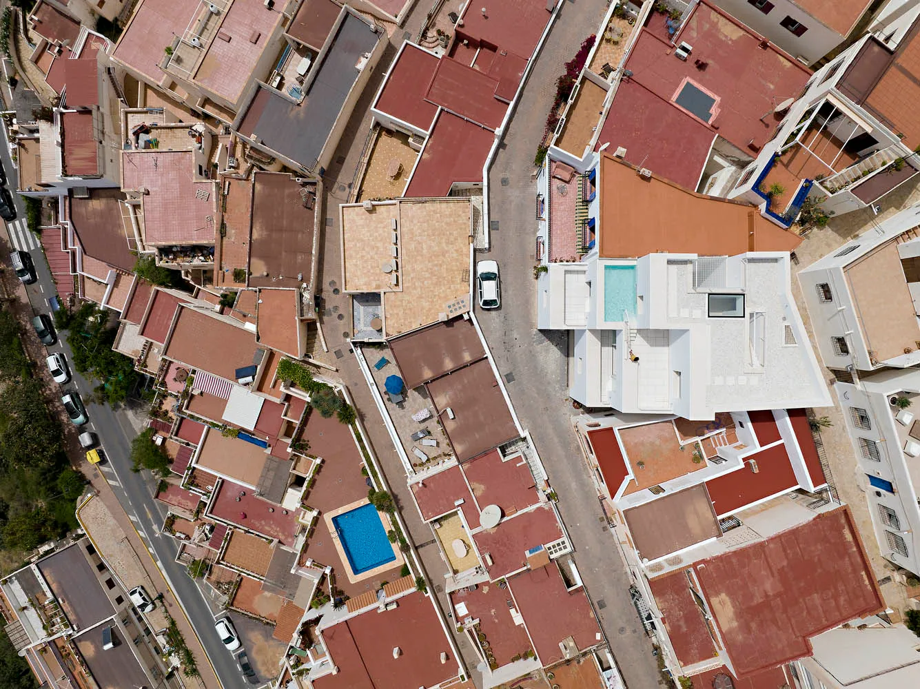 Aerial view of an urban space featuring a mix of terrazzo and ceramic tile surfaces.