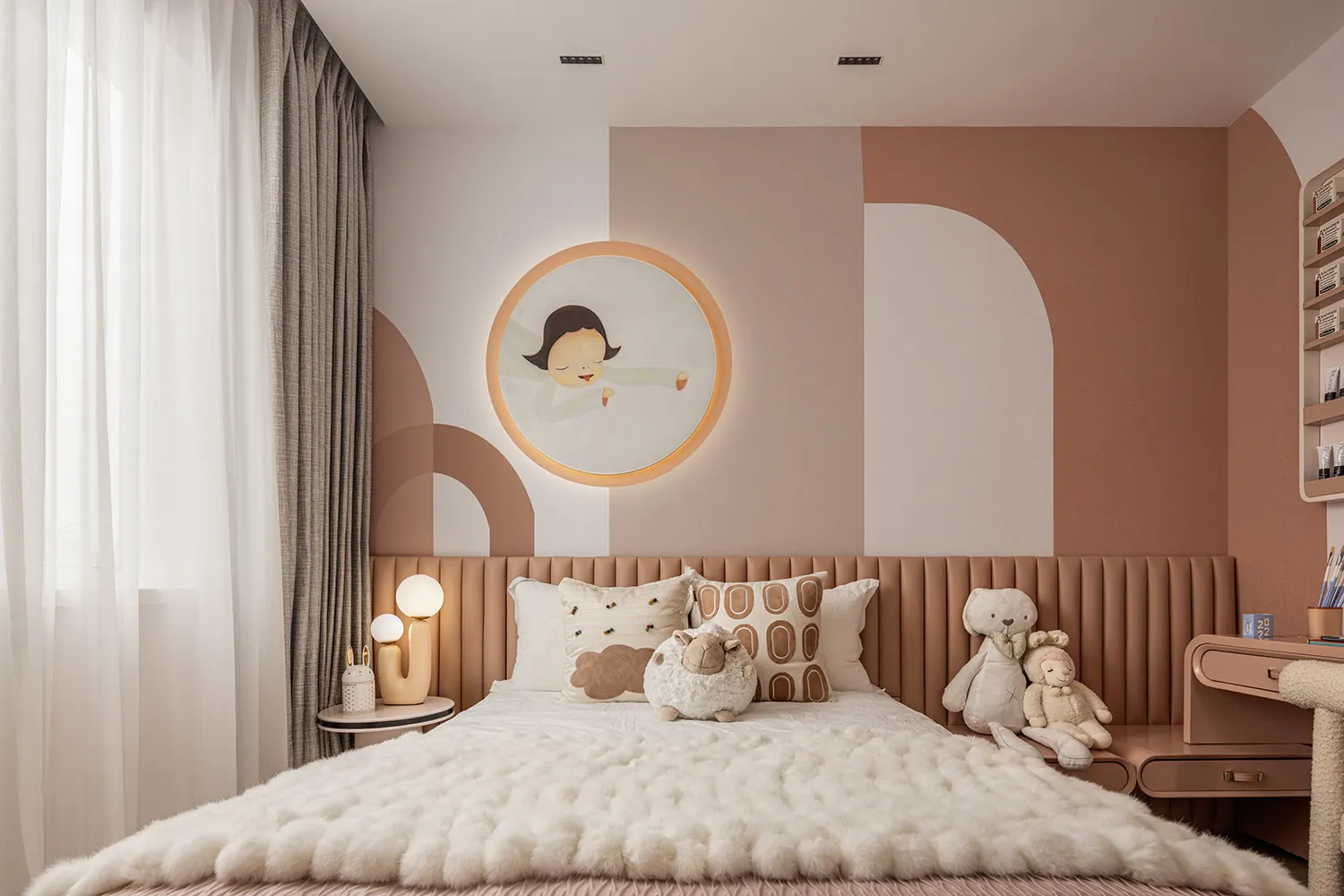A minimalist children's bedroom featuring a bed with a white fur blanket, stuffed animals, and a light-colored headboard.
